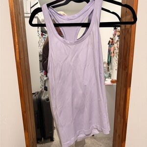 Swiftly tank hip length